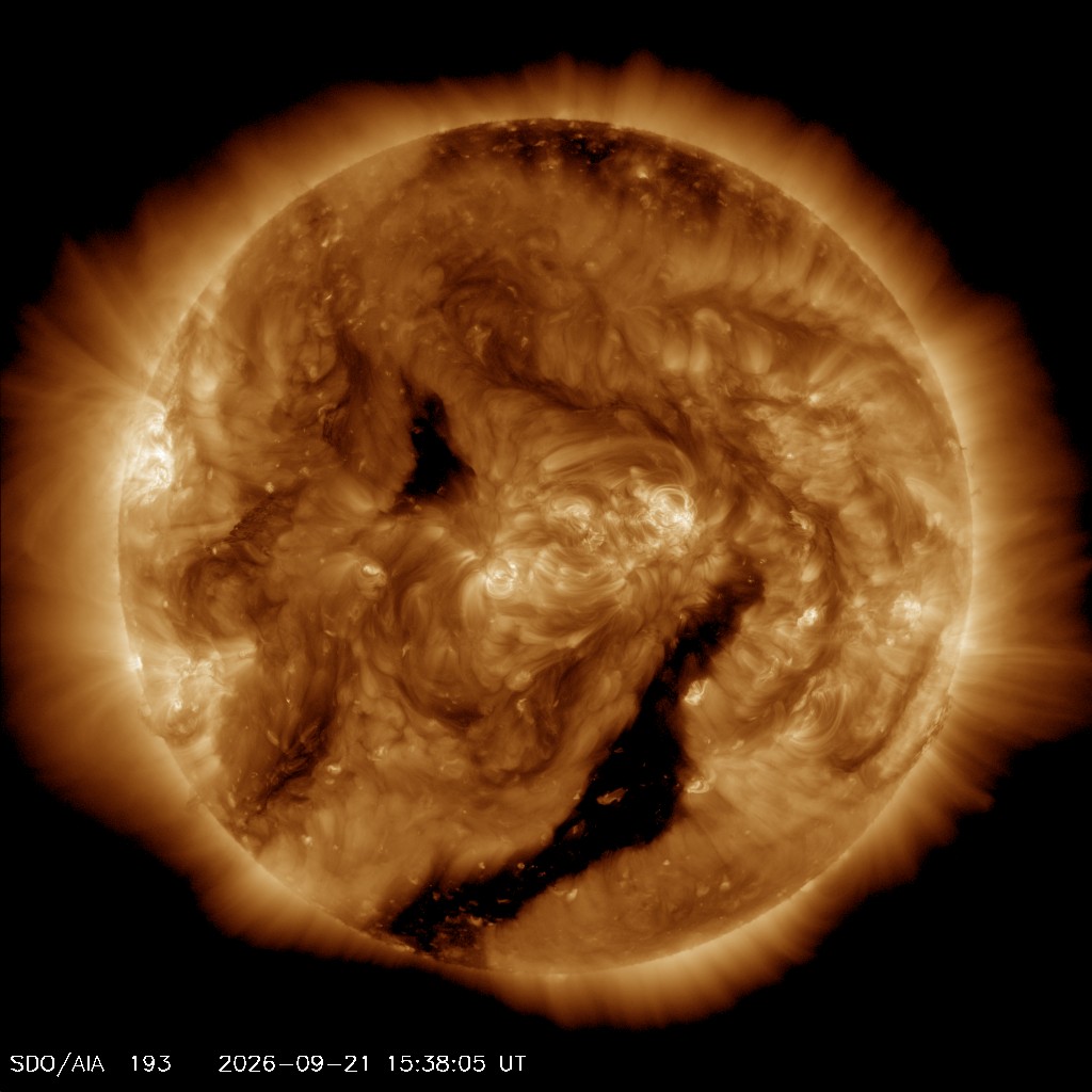 The sun in extreme ultraviolet light, showing bright active regions and darker coronal hole patches